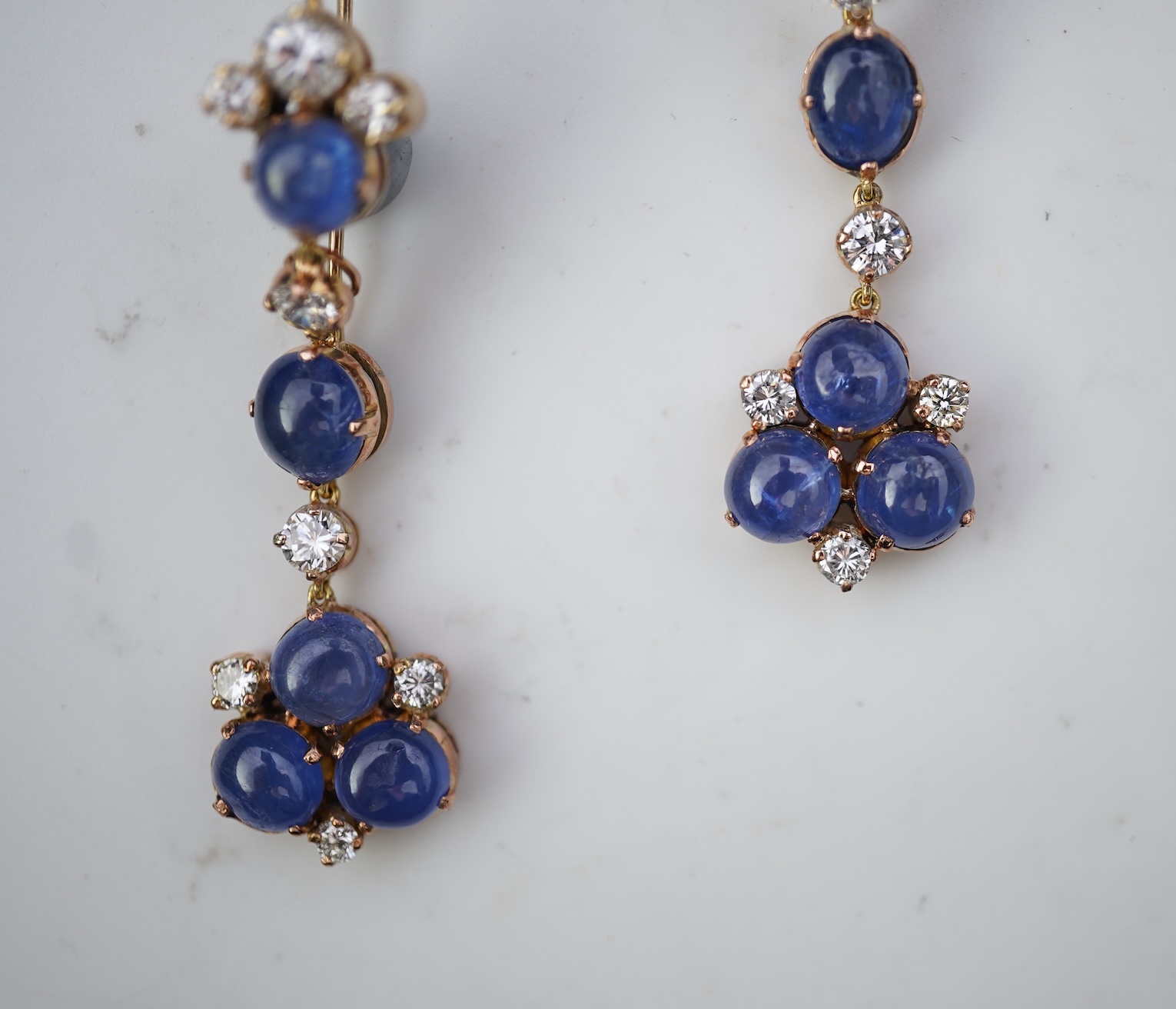 A pair of sapphire and diamond drop earrings